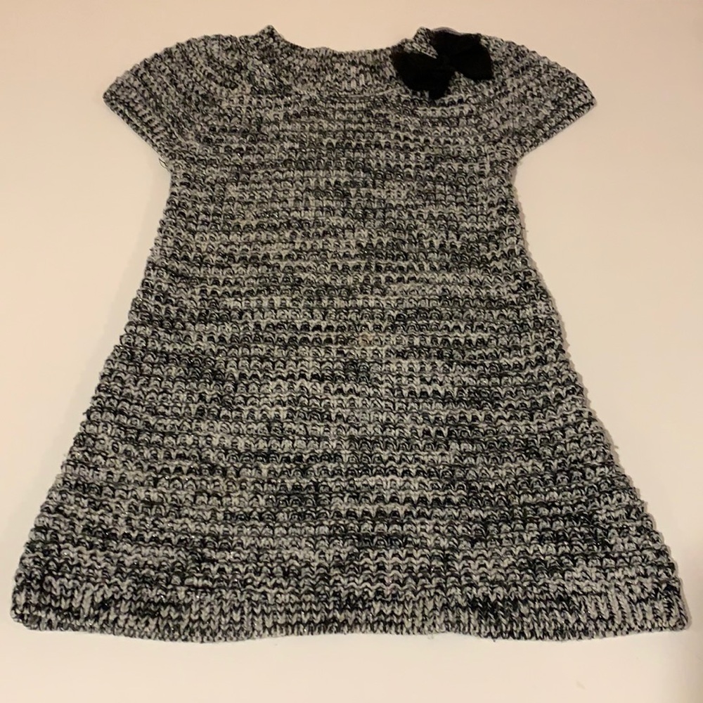 Girls black and white knit dress with black bow